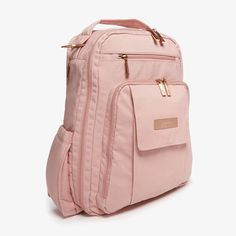 a pink backpack is shown on a white background