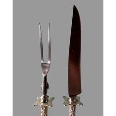 two knifes are shown with their blades still attached to the knives they have been used for