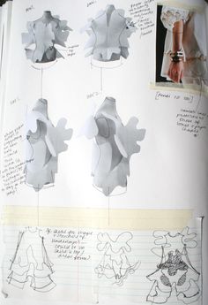 an open book with drawings and instructions on how to make paper dolls, including dresses