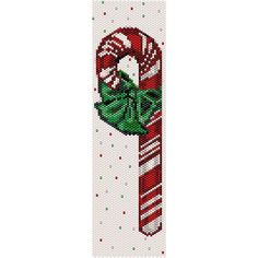 a cross stitch christmas decoration with candy canes and holly leaves on the side,