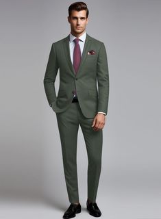 Seasonal colors are a great way to keep your tailoring interesting, so investing in our Huddersfield Stretch Autumn Green Wool Suit is a wise choice. Crafted from a wool blend, this suit ensures both style and comfort. The solid pattern and refreshing autumn green tone render it an excellent selection for leaving a lasting impression at the office, weddings, and other special occasions. 
 
Introducing "Voyager" collection, a truly exceptional fabric that combines luxury and performance. Crafted from super 100's australian merino wool fiber with touch of lycra for flexibility and resillience is enriched with prunelle weave that ensures a lively draping and crease resistance feature. 
  Look Includes     Huddersfield   Stretch   Autumn   Green   Wool  Fabric  Two Button Jacket Style  Notch L Green Wool Suit With Suit Collar, Fitted Green Wool Suit, Green Fitted Wool Suit, Green Fitted Tweed Jacket With Notch Lapel, Fitted Green Tweed Jacket With Notch Lapel, Fitted Green Tweed Jacket With Welt Pockets, Green Suits With Welt Pockets For Semi-formal Occasions, Semi-formal Green Suits With Welt Pockets, Green Semi-formal Suits With Welt Pockets