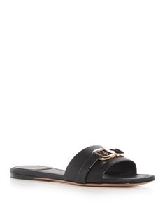 Ferragamo Women's Leah Double Gancini Slide Sandals Luxury Flat Sandals With Tang Buckle, Elegant Flat Heel Sandals With Tang Buckle, Luxury Beach Sandals With Tang Buckle, Slide Sandals, Black Sandals, Shoes Sandals, Sandals, Black