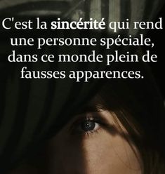 a woman's face with her eyes closed and the words in french above it