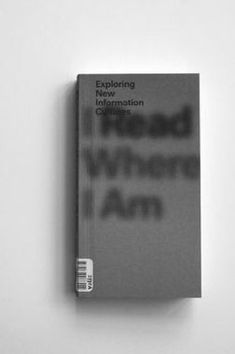 a book that is sitting on top of a white surface with the title exploring new information centers