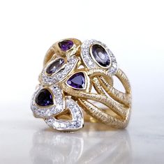 Sterling Silver 18k Gold Plated Ring With Topaz, Amethyst, And Tanzanite Size 9.5 Brand New, Never Worn With Tags 18k Gold Plated Over Sterling Silver Small White Topaz, Amethyst, Smoke Topaz, Blue Topaz, And Tanzanite Finished Under Gallery Ring Size 9.5 Luxury Purple Multi-stone Sapphire Ring, Elegant Multi-stone Amethyst Ring In Yellow Gold, Yellow Gold Multi-stone Fusion Gemstones, Fusion Style Multi-stone Yellow Gold Gemstones, Elegant Yellow Gold Multi-stone Amethyst Ring, Formal Tanzanite Multi-stone Gemstones, Luxury Multi-stone Birthstone Ring, Elegant Purple Multi-stone Sapphire Ring, Elegant Yellow Gold Rings With Stones