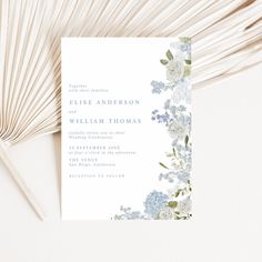 Celebrate your special day with our enchanting wedding invitation featuring a romantic and delicate soft dusty blue watercolor floral border design. Adorned with beautiful blue hydrangea, delphinium, white roses, and greenery, this invitation exudes elegance and charm. The timeless minimalist dusty blue font adds a touch of sophistication, perfect for any wedding theme or style. Set the tone for your dream wedding with this exquisite invitation that will enchant your guests and create lasting memories of your love story. Wedding Invite Fonts, Floral Wedding Invitation Background, Blue Floral Wedding Invitations, Hydrangea Invitation, Blue Floral Invitation, Delphinium White, Soft Blue Wedding, Watercolor Floral Border, Hydrangea Wedding Invitations