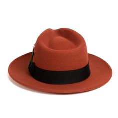 Add timeless style to any look with our classic Fedora Hat. This hat is fully crushable - stuff it into any suitcase or bag and it will take its shape again when you unpack it. The perfect travel hat! Features: 100% Wool Felt Grosgrain Ribbon Removeable Feather Accent (FEATHER COLOR VARIES!) Fully Crushable | Great For Travel Crown: 5 inches high Brim: 2 inches Fedora Dress, Travel Hat, Wool Fedora, Dress Hat, Colorful Feathers, Dress Hats, Garment Bags, Fedora Hat, Grosgrain Ribbon