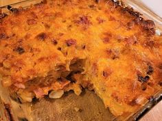 a casserole dish with meat and cheese