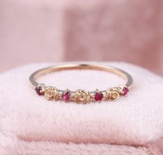 Vintage Roses Flower Ruby Wedding Band, Victorian Rose Gold Half Eternity Ring, July Birthstone, Antique Gemstone Rings, Natural Ruby Rings ✧･ﾟ: *✧･ﾟ:* Welcome to Charles Davin Jewelry*:･ﾟ･ﾟ✧ ✶Material: 10K/ 14K/ 18K ✶Main Stone: Natural Ruby; Total: 0.20ct, 2.0mm-4 ✶Side Stone: - ✶Width of band: 1.4mm ✶Thickness of band: 1.1mm PRODUCTION TIME My team of jewelry artisans and I are ecstatic and cannot wait to share our passion, joy and creativity with you! Our jewelry are completely crafted by ha Ruby Ring Designs, Antique Gemstone Rings, Ruby Wedding Band, Natural Ruby Ring, Wedding Rings Photos, Ruby Rings, Roses Flower, Ruby Wedding, Half Eternity Ring