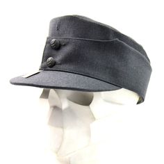 "Original Finnish army field cap Featuring leather sweatband, national crested buttons, and hole for regimental cockade Flaps fold down for cold weather. These are the same style used by the Finnish and Germany military during the WWII in the 1940's Condition - NEW. Please take note: Cap might have incorrect genuine size tags. For the most cap original size tag, it's specified 2 sizes larger or 2 sizes smaller. For example, you might find a genuine size tag on the cap \"55\", but the real size i Military Style Hat With Short Brim, Winter Military Cap, Military Cap For Hunting, Military Style Short Brim Winter Hat, Cap Winter, Quality Hats, Cool Hats, Same Style, Wool Hat