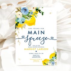 a wedding card with flowers on it