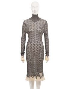 For Sale on 1stDibs - ▪ Christian Dior archival dress ▪ Creative Director: John Galliano ▪ Fall-Winter 1998 ▪ Knitted from metallic silver viscose yarn with open-knit chevron Designer Fitted Winter Dress, Knit Chevron, Dior By John Galliano, Dress With Lace Trim, John Galliano, Dress With Lace, Open Knit, Creative Director, Christian Dior