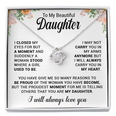 a necklace with the words to my beautiful daughter on it