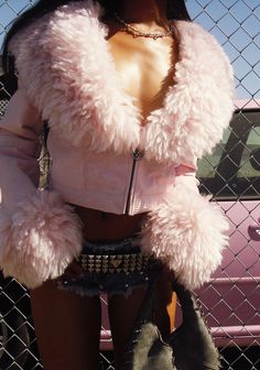 you're the talk of the town. This cropped moto jacket has a vegan leather construction, statement faux fur trim, buckle strap details, and a front zip closure with a crown logo charm. Faux Fur Trim Cardigan, Pink Fur Outfit, Leopard Print Jacket Outfit, Print Jacket Outfit, Denim Fur Jacket, Fur Jacket Outfit, Short Fur Coat, Outfit Wishlist, Kiss Outfits