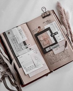 an open book with pictures and writing on it