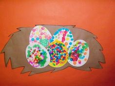 an art project made out of paper with donuts and sprinkles on it