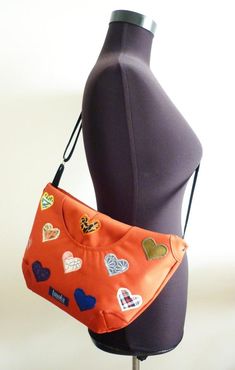 Colorful purse rainbow orange boho boheme purse crossbody bag with hearts multicolor halloween pumpkin fiesta happy hippie bag purse messenger bag, canvas bag, shoulder bag, hobo bag.Pockets inside, two way zipper closure. There's a magnetic closure pocket in the front side, and one zipper closure pocket in the back side.It's made from high quality waterproof water resistant cordura.It's called Pluto. :)✦✦✦ DIMENSIONS ✦✦✦Width on the top: 34cm / 13,3 inchesHeight: 22 cm / 8,6 inchesStrap length Orange Crossbody Hobo Bag For Travel, Orange Crossbody Hobo Bag For Everyday, Bohemian Orange Crossbody Shoulder Bag, Fall Orange Crossbody Bag, Orange Tote Shoulder Bag For Gift, Bohemian Orange Bag As Gift, Bike Messenger Bags, Colorful Purse, Plaid Purse