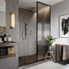 a modern bathroom with black and gold accents