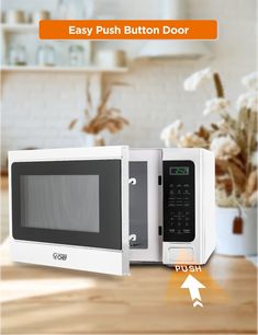 an easy push button door on a microwave