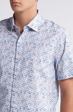 Featuring a watercolor-style microprint, this summery shirt is cut from pure cotton to keep you cool. 29" length, 42" chest (size medium) Front button closure Spread collar Short sleeves 100% cotton Machine wash, line dry Made in Turkey Blue Shirt With All Over Print For Spring, Blue Cotton Shirt With Abstract Print, Casual Shirt With Abstract Print And Spread Collar, Blue Casual Top With Watercolor Print, Casual Blue Watercolor Print Top, Blue Casual Watercolor Print Top, Blue Short Sleeve Tops With Watercolor Print, Blue Short Sleeve Top With Watercolor Print, Light Blue Cotton Shirt With Floral Print