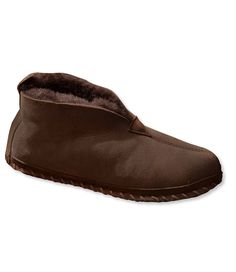 We searched all around the globe for the finest genuine shearling to make our popular Wicked Good Slippers even better. Just slip into these incredibly soft sheepskin slippers and it's easy to see how they got their name. Fits best with lightweight sock or barefoot. Half sizes order up. Sheepskin suede upper gets softer with age. Genuine shearling lining. Indoor leather sole. Imported. Brown Sheepskin Closed Toe Slippers, Shearling Slippers With Rubber Sole And Closed Toe, Classic Sheepskin Slippers For Winter, Brown Winter Slippers With Leather Sole, Shearling Slippers With Faux Fur Lining And Round Toe, Winter Leather Moccasins With Rubber Sole, Classic Slippers With Sheepskin And Suede Lining, Sheepskin Slippers With Leather Sole And Round Toe, Classic Sheepskin Slippers With Suede Lining