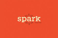 an orange background with the word spark written in white