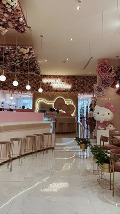 the interior of a restaurant with hello kitty decorations