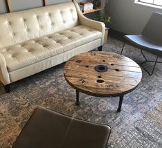 a living room with two couches and a coffee table in the middle of it