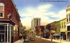 an old postcard shows a street scene in the early 1900's or early 1970's