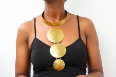 African Brass necklace, Brass jewelry, African jewelry for women, Tribal necklace, One size fits all, Christmas Gift for her, Moms gift The necklace is handcrafted using brass metal. Length: 11 inches Shipping fee is for the first item only, additional items ship for FREE. DHL Express shipping with 3-5 days delivery. To view our brass collection, click here: https://www.etsy.com/shop/NkoroiCrafts?ref=simple-shop-header-name&listing_id=1295061994&section_id=39639351 *Care instructions* Brass tarn Unique Luxury Brass Necklaces, Ceremonial Handmade Brass Necklaces, Ceremonial Hallmarked Brass Necklaces, Bohemian Brown Brass Necklace, African Brass Jewelry, Art Nouveau Pendant, Gold Long Necklace, Beaded Collar, Brass Necklace