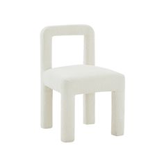 a white chair sitting on top of a white floor