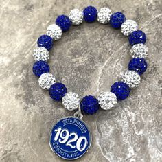 Hand-crafted with bling eads. The bracelets are strung on thick durable stretch cord. Each order includes: ONE (1) bracelet Zeta Phi Beta, Engraved Items, One 1, Gemstone Bracelets, Jewelry Bracelets, Hand Crafted, Handmade Items, Charm Bracelet, Beaded Bracelets