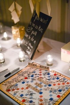 a board game on a table with candles