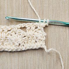 the crochet stitch is being worked on