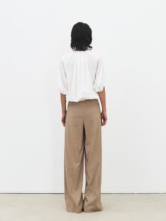 This is a minimal and feminine pants by MOHAN that is made out of high quality and sturdy fabric. With design detail that gives a trendy and refined mood, you can style it with various items for a clean daily outfit. - Semi high waistline- Belt included- Front zipper, hidden button, and loop- Cool touch of linen blend fabric Feminine Pants, Wide Trousers, Daily Outfits, 2 Colours, Front Zipper, Linen Blend, Design Details, Trousers, Zipper