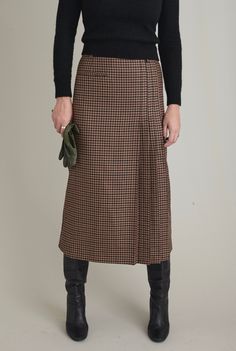 Introducing a sample sale item: our best-selling wool midi pleated skirt for women in size XS, with a 26" waist, in a lovely plaid brown shade. Crafted from luxurious, no-longer-available fabric, this exclusive photo shoot piece is now on sale! Made from 100% Italian wool and fully lined with 100% viscose, it features a side welt pocket, back zipper closure, and belt loops. This super chic midi skirt is perfect for fall and winter office wear, designed for elegant ladies who appreciate timeless Wool Skirt Outfit Winter, Wool Skirt Outfit, Winter Office Wear, Brown Midi Skirt, Wool Pleated Skirt, Skirt For Fall, Long Plaid Skirt, Winter Office, Plaid Brown