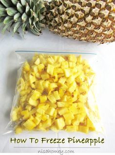 how to freeze pineapple in a plastic bag on a white tablecloth next to a pineapple