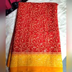 Indian Tribal Print Saree In Color Red And Yellow Festive Red Dupatta With Batik Print, Red Batik Print Dupatta For Festivals, Red Dupatta With Batik Print For Festivals, Traditional Red Batik Print Dupatta, Yellow Block Print Traditional Wear For Festivals, Red Block Print Saree For Puja, Yellow Block Print Dupatta For Festive Occasions, Festive Yellow Block Print Dupatta, Red Dupatta With Printed Border For Puja