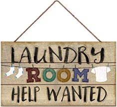 a wooden sign that says laundry room help wanted