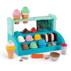 a toy ice cream stand with lots of treats