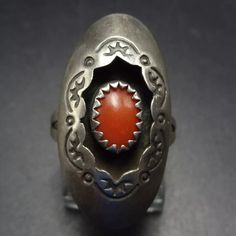 SIGNED NAVAJO RED MEDITERRANEAN CORAL STERLING SILVER SHADOWBOX RING DESCRIPTION:  This ring will be a treasured addition to your collection of fine vintage Southwestern and Native American jewelry. MEASUREMENTS:  Ring face measures 1 1/8" x 1/2" RING SIZE: 5 1/2 WEIGHT: 3.4 grams SIGNED:  AR conjoined, over right facing curved arrow  STERLING:  yes, stamped STERLING Curved Arrow, Jewelry Measurements, Jewelry Picture, American Jewelry, Native American Jewelry, Vintage Signs, Rings Statement, Sterling Silber, Shadow Box