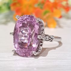 10.50 Carat Natural Kunzite & Diamonds 14k Solid Gold Ring Ring Material: 14k Solid Gold Total Metal Weight: 4.8 Grams Gemstone: Natural Kunzite Gemstone Color: Delicate Light Pink Gemstone Shape: Oval Gemstone Dimensions: 15.00x11.00 mm Gemstone Carat Weight: 10.40 Carat Gemstone Quantity: 1 Diamonds: Natural Round Shaped Diamonds Quantity: 4 Diamonds Total Carat Weight: 0.10 Carat Total Carat Weight: 10.50 Carat Ring Quantity: One Ring Condition: New Made in the USA Delivered in an elegant gif Oval Center Stone Gemstones For Formal Occasions, Oval Platinum Gemstone With Center Stone, Oval Gemstones With Prong Setting For Formal Occasions, Exquisite Oval Gemstones For Formal Occasions, Exquisite Oval Platinum Gemstones, Exquisite Oval Gemstones For Formal Events, Elegant Oval Gia Certified Gemstones, Gia Certified Oval Rings For Formal Occasions, Oval Topaz Ring In Platinum