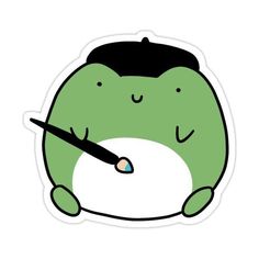 a sticker with an image of a green creature holding a pen in it's mouth