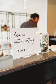 a sign that is sitting on top of a counter