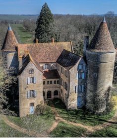 an aerial view of a castle in the countryside