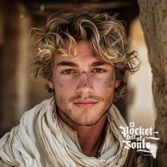 a close up of a person wearing a scarf and looking at the camera with a serious look on his face