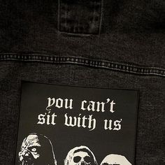 there is a sticker on the back of a pair of jeans that says you can't sit with us