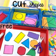 cut shapes on a tray with scissors and glue to make them look like they have been made out of construction paper