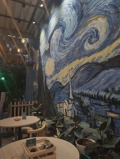 an artistic painting on the wall of a restaurant