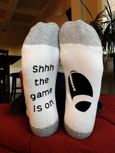 Need lucky socks on game day? Looking for a gift to give a football-lover? Want a pair for yourself too? These custom football socks are perfect! This listing is for one pair of white crew socks with a grey heel/toe, and a black image. They fit a standard mens 6-12 size shoe. Our socks Sock Sayings, Cricut Socks, White Crew Socks, Cool Christmas Gifts, Game Day Quotes, Sock Ideas, Football Lover Gifts, Sublimation Socks, Stocking Stuffers For Teens